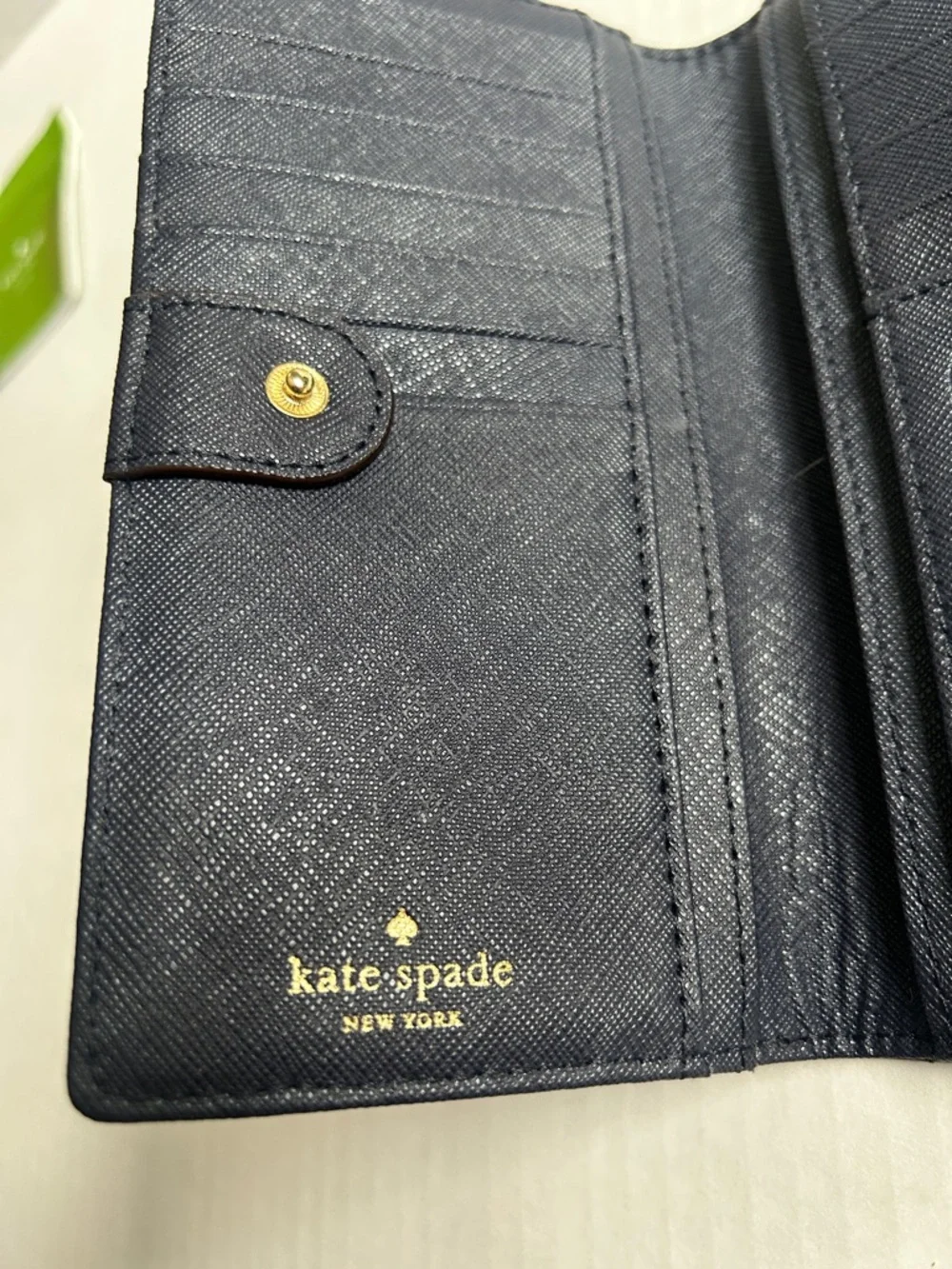 Kate Spade Newbury Lane Stacy Bifold Wallet In Navy Leather